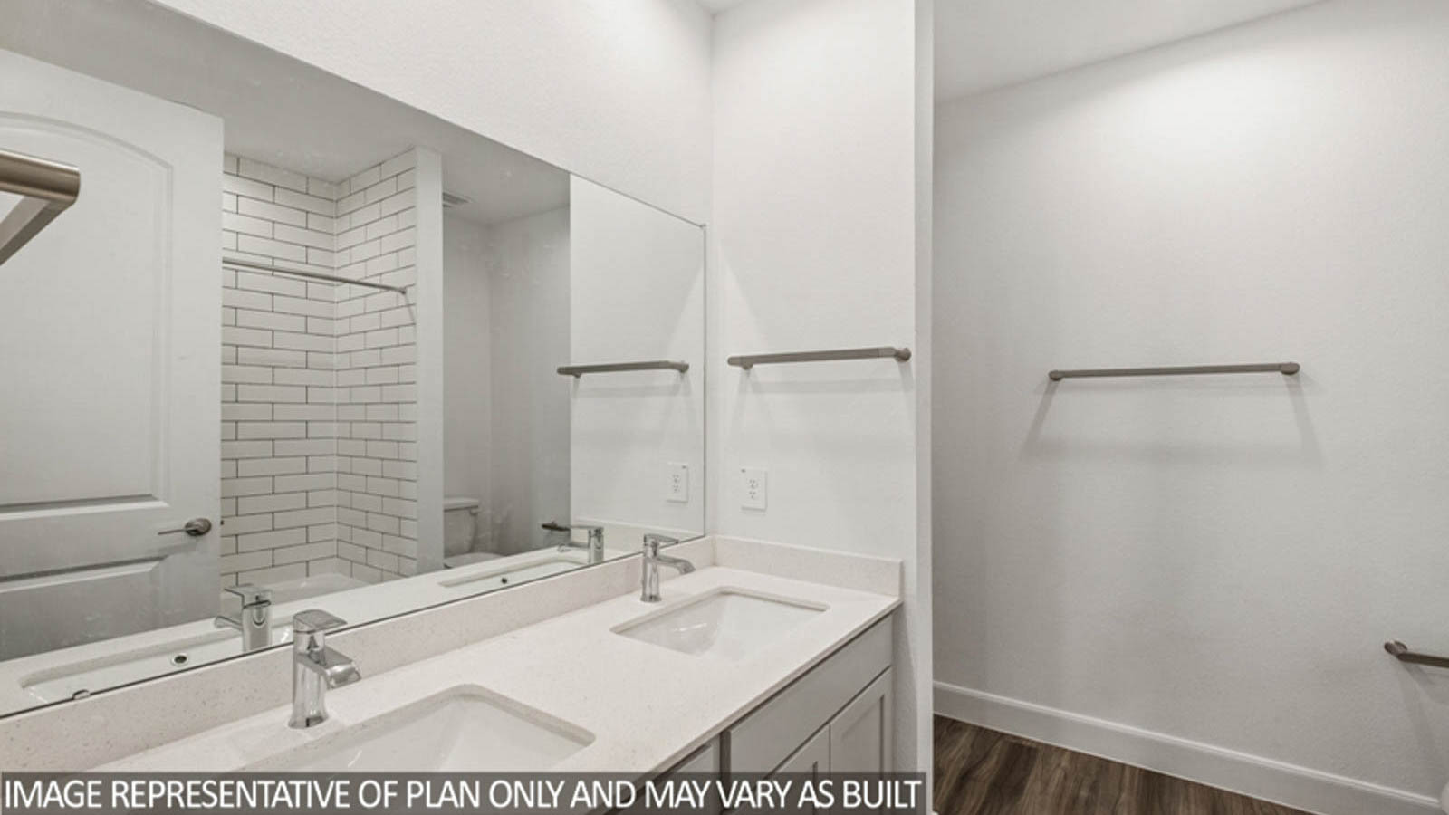 Secondary bathroom with a double sink and vinyl flooring.
