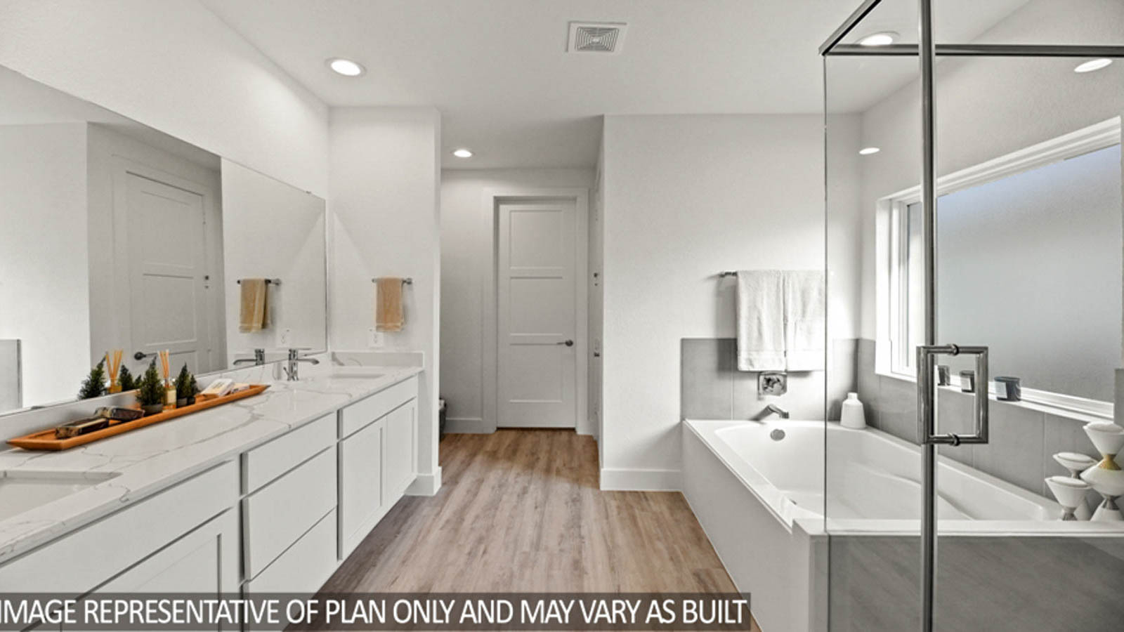 Primary bathroom with tub and shower