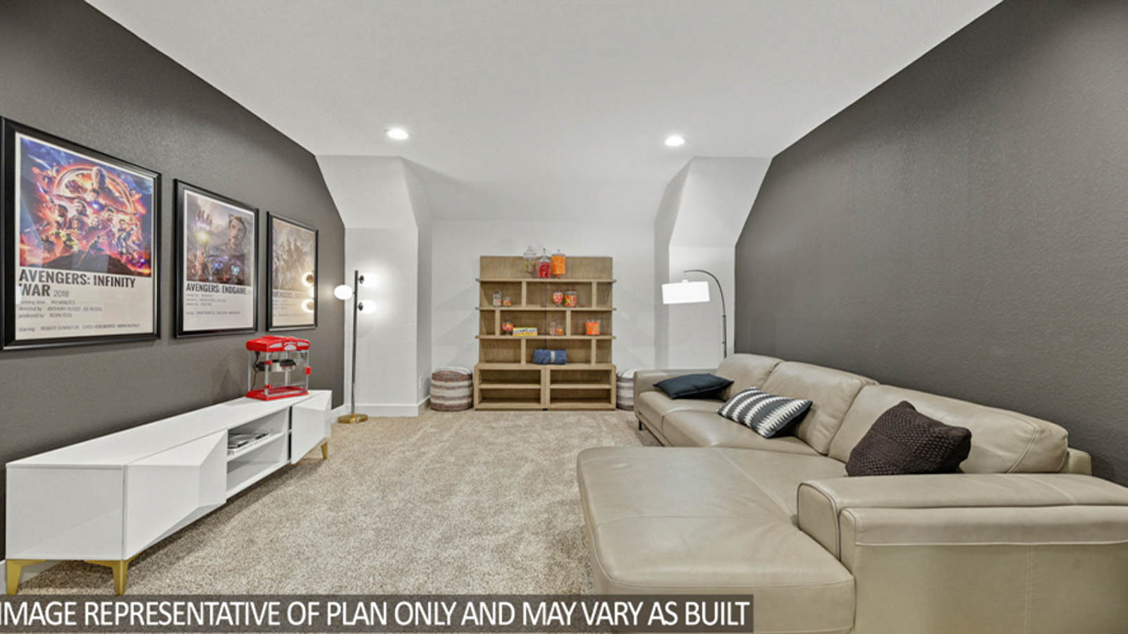 Media room with carpet flooring.