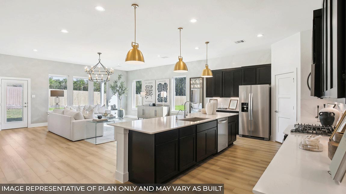 Open concept living, dining, and kitchen area