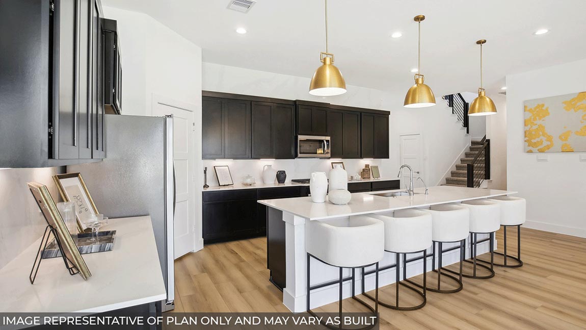 Open concept living, dining, and kitchen area