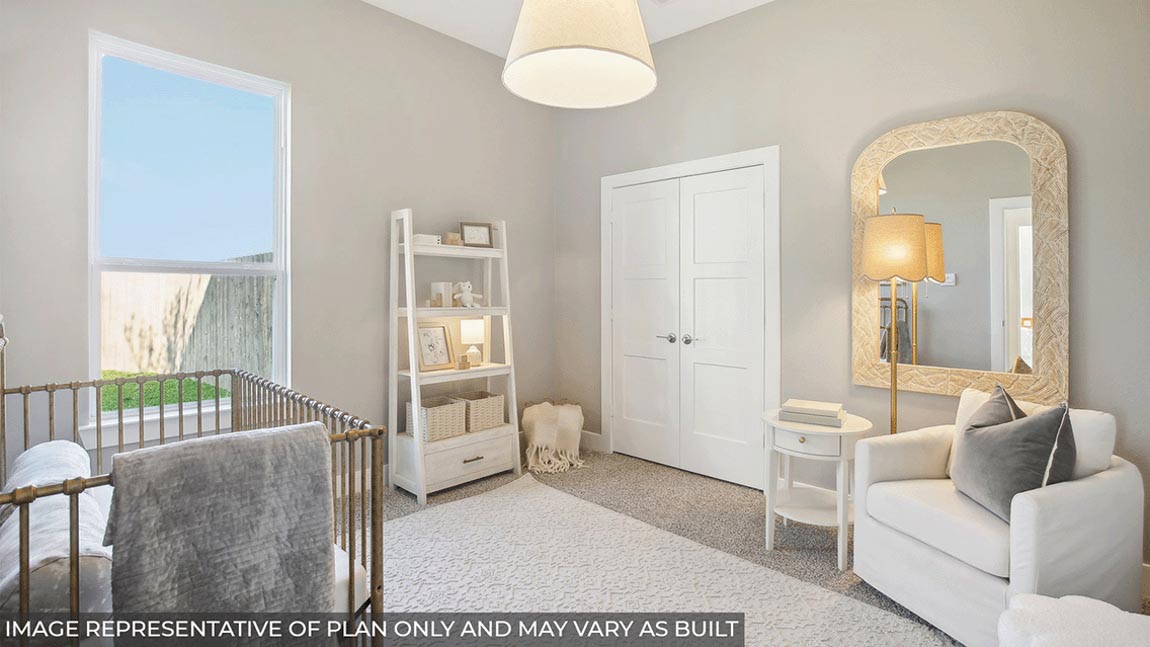 Secondary bedroom with carpet flooring