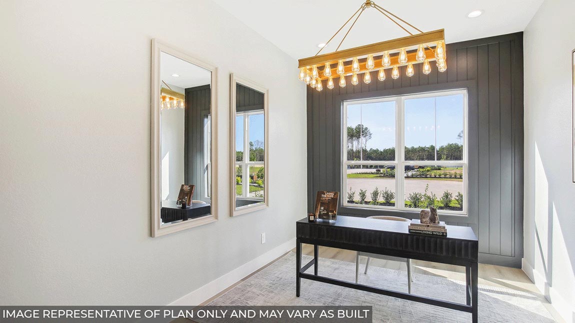 Study with vinyl flooring and big windows