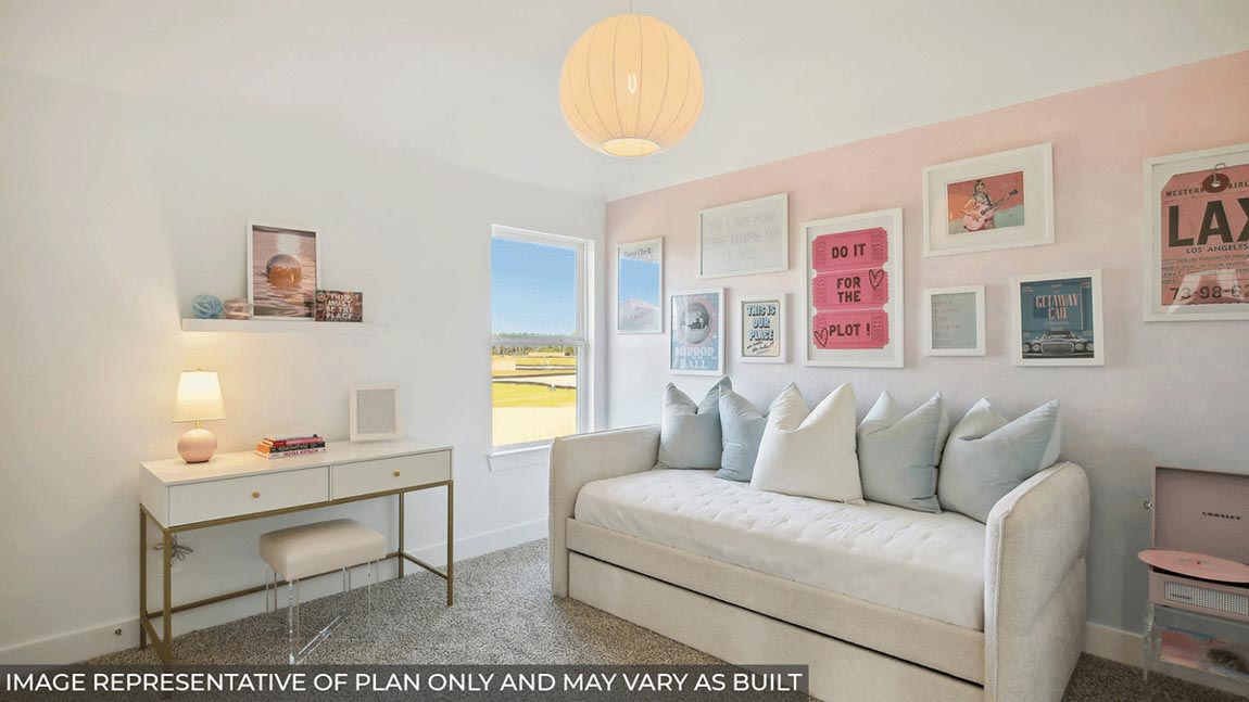 Secondary bedroom with carpet flooring