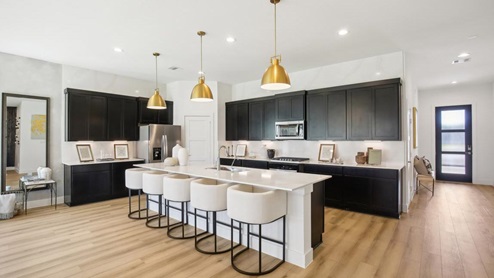 L shaped kitchen with oversized island