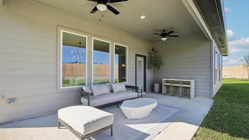 Large Back Patio with fans and lighting