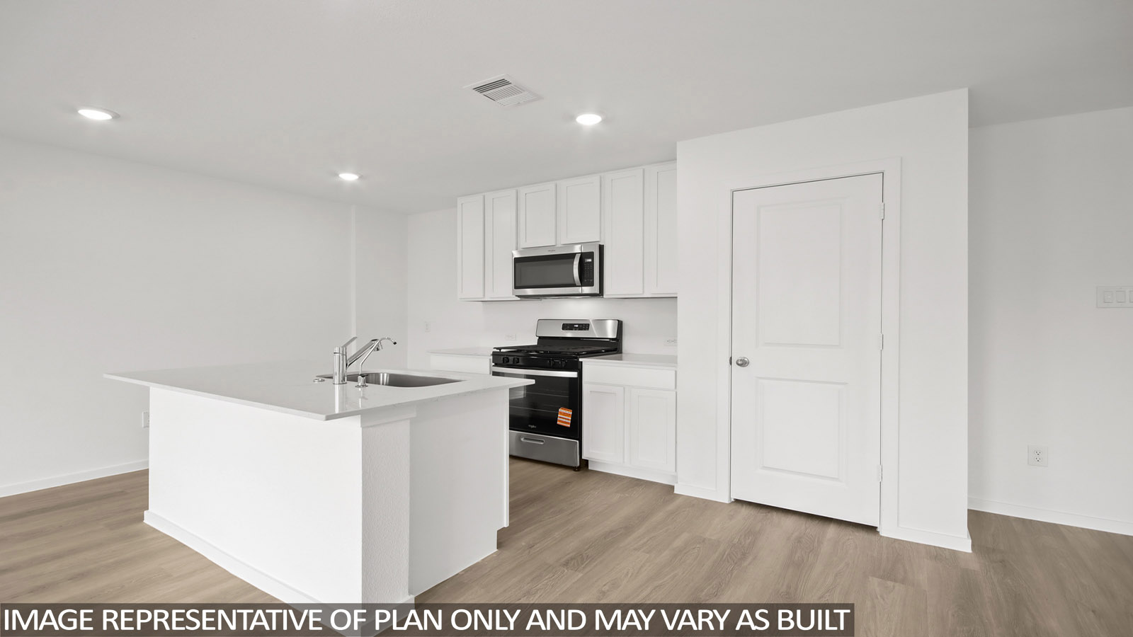 Open concept living, dining, and kitchen area