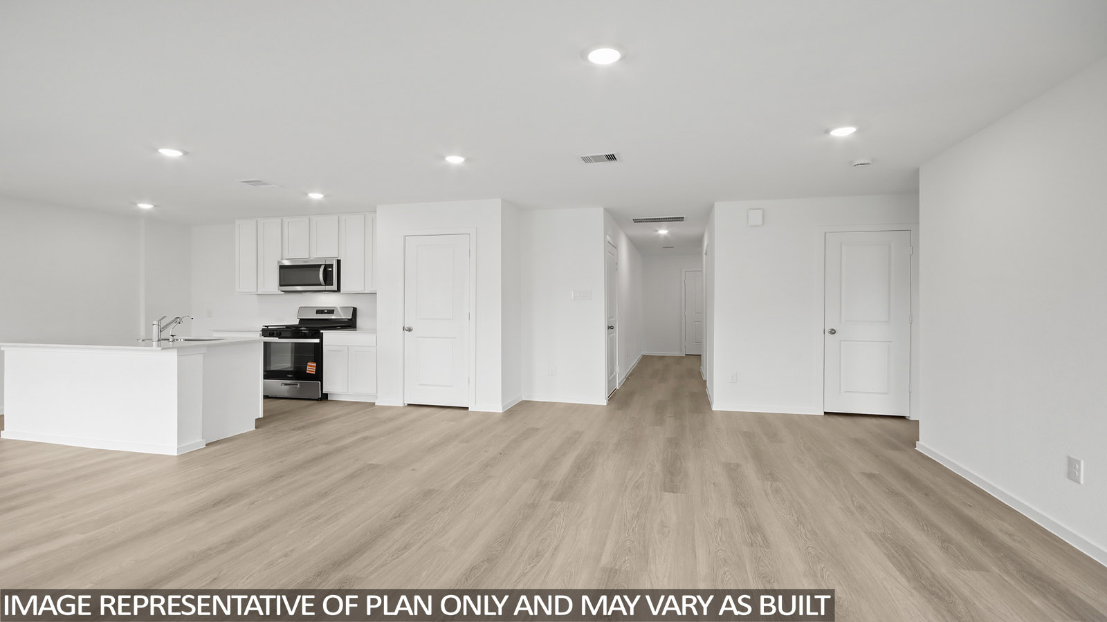 Open concept living, dining, and kitchen area
