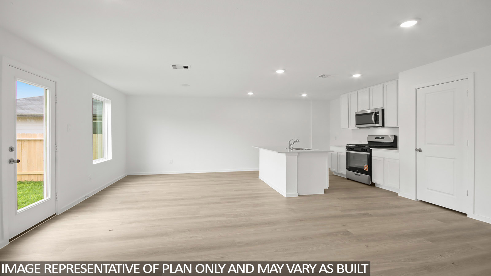Open concept living, dining, and kitchen area