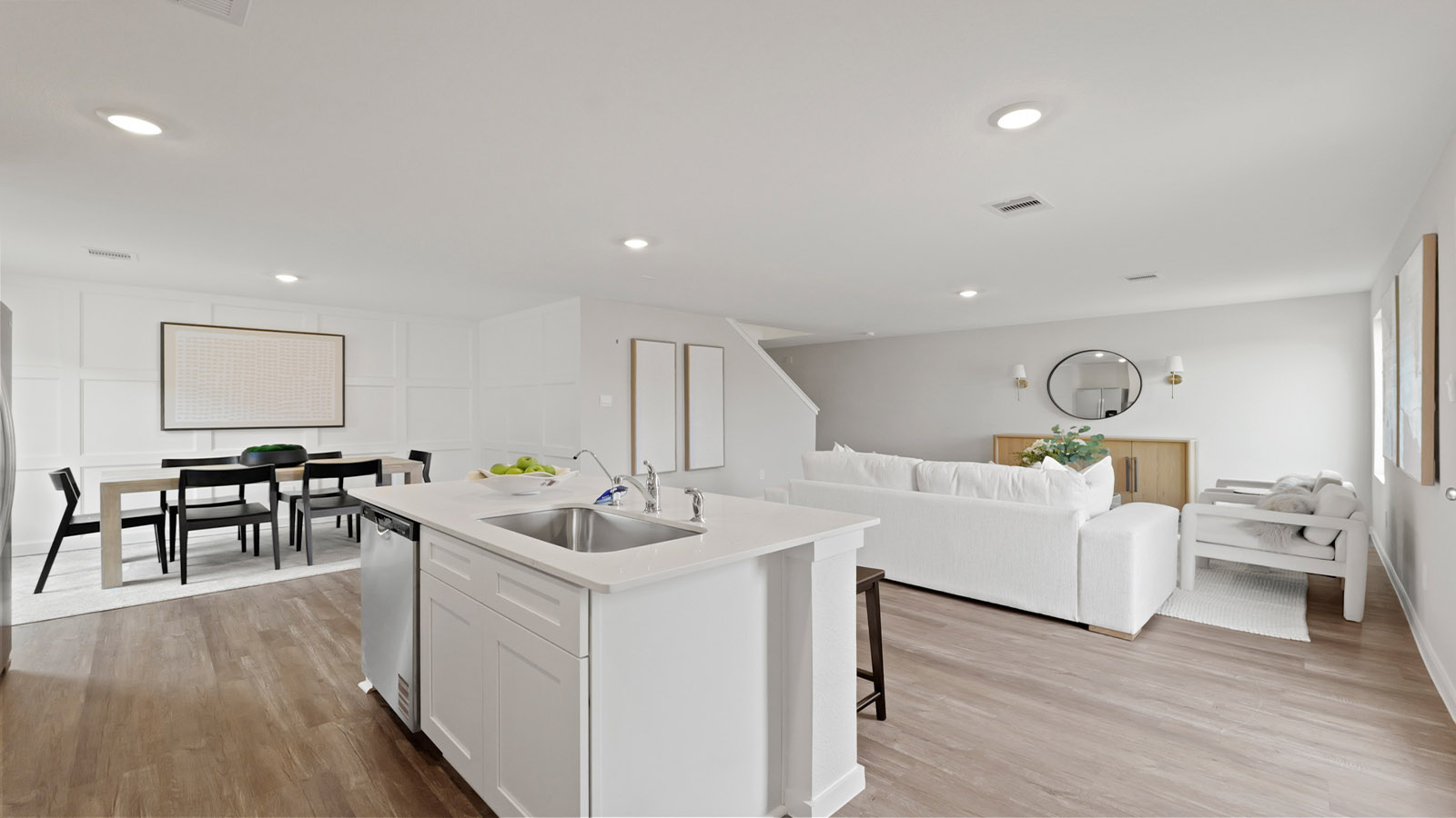 Kitchen with an island and stainless-steel appliances.