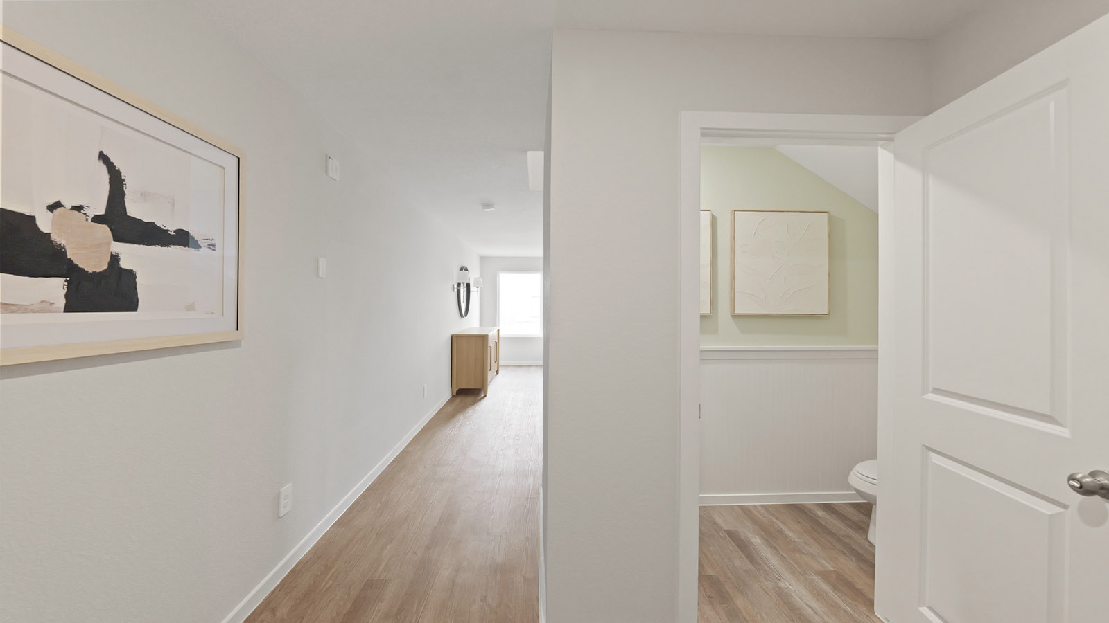 Entryway and foyer with vinyl flooring.