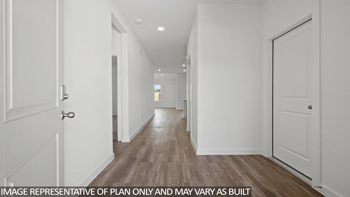 Entry hallway with vinyl flooring