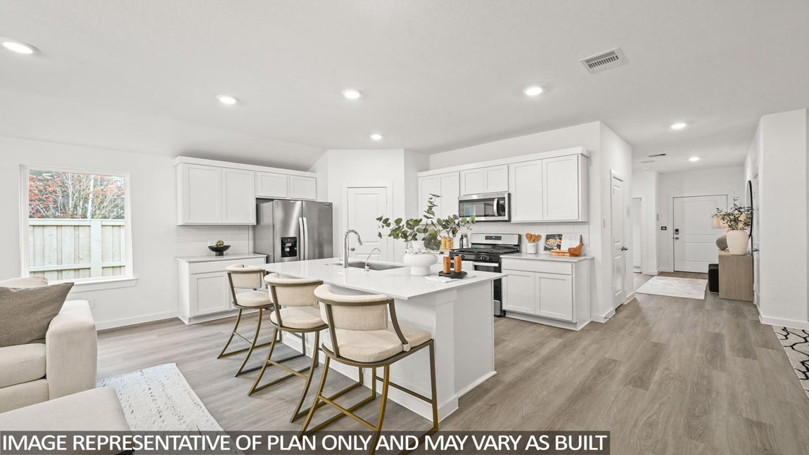 Open concept living, dining, and kitchen area