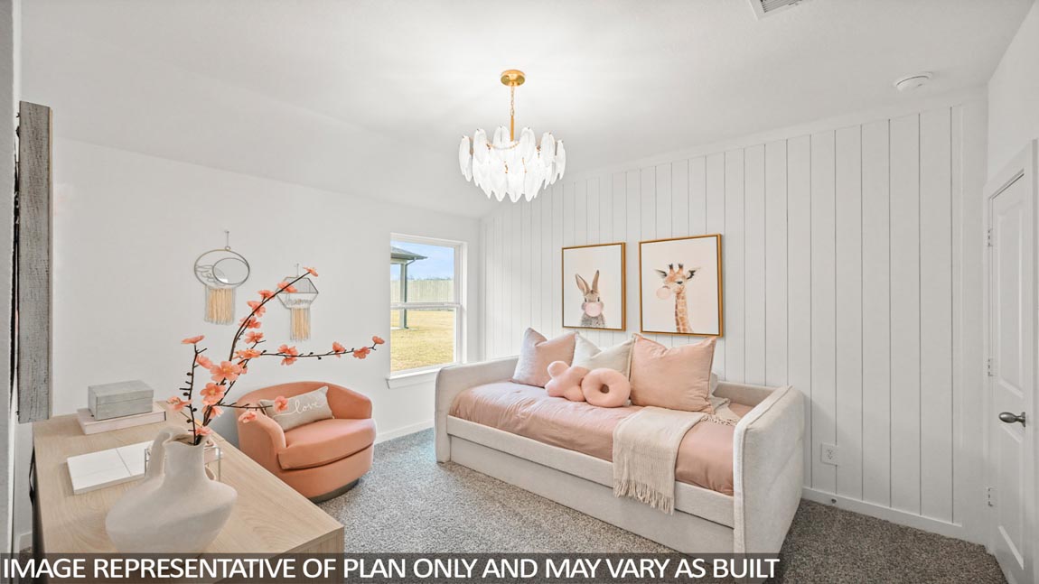 Secondary bedroom with carpet flooring