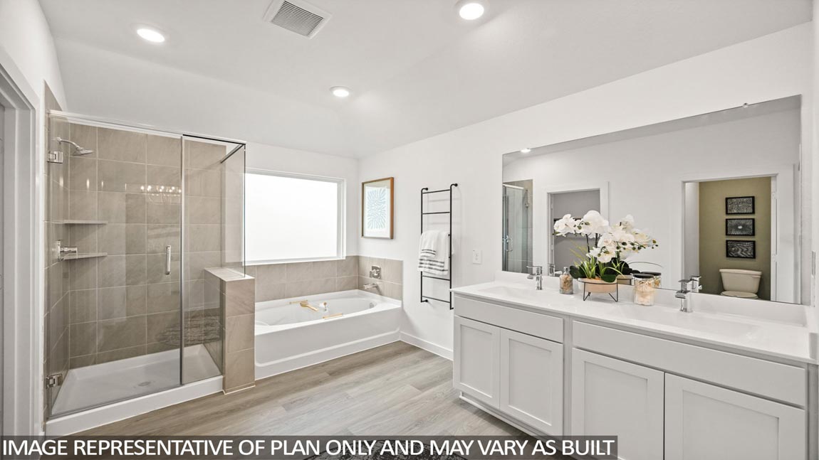 Primary bathroom with tub and shower