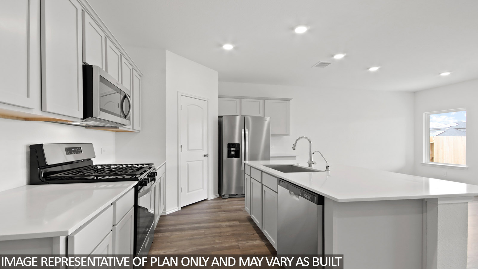 Open concept living, dining, and kitchen area