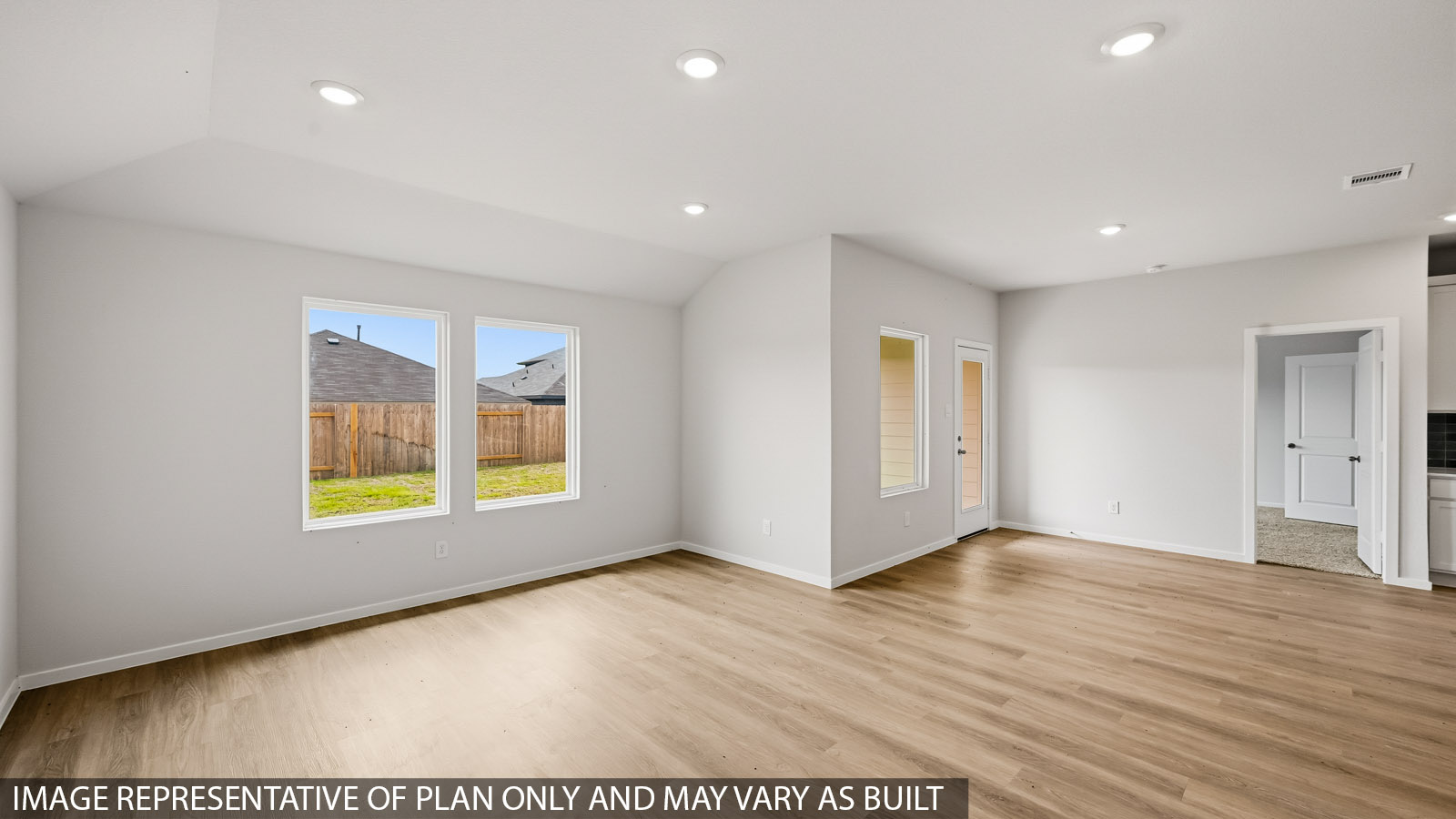 Open concept living, dining, and kitchen area