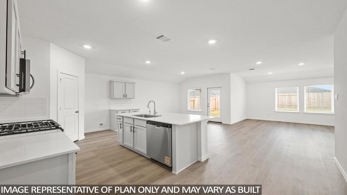 Open concept living, dining, and kitchen area
