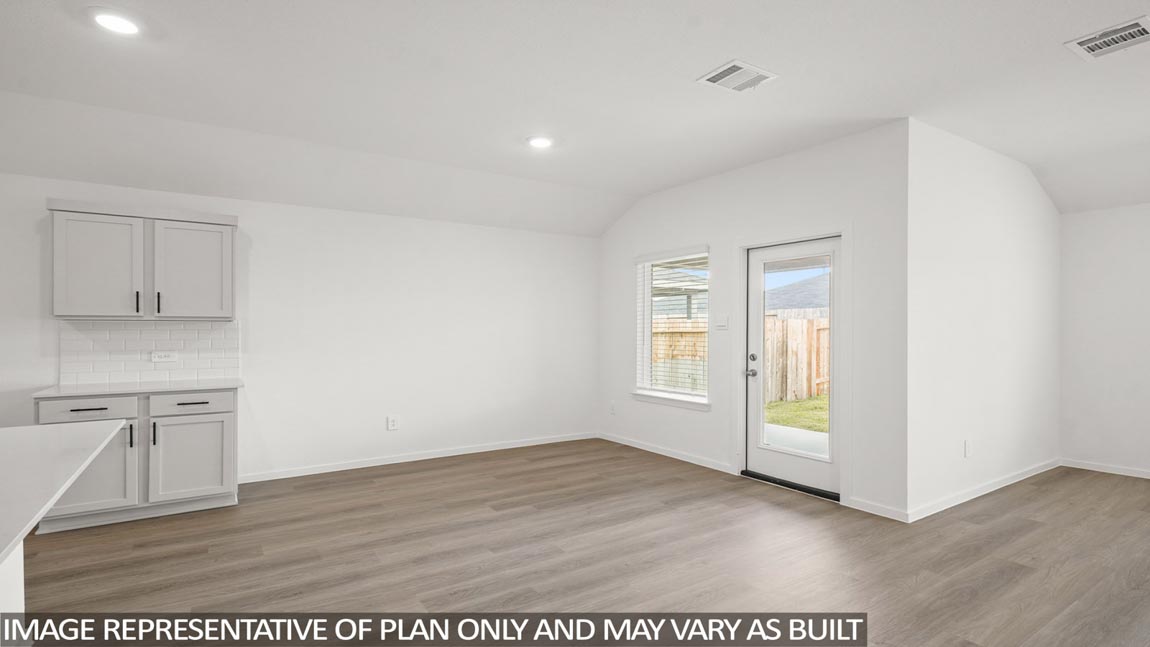 Open concept living, dining, and kitchen area