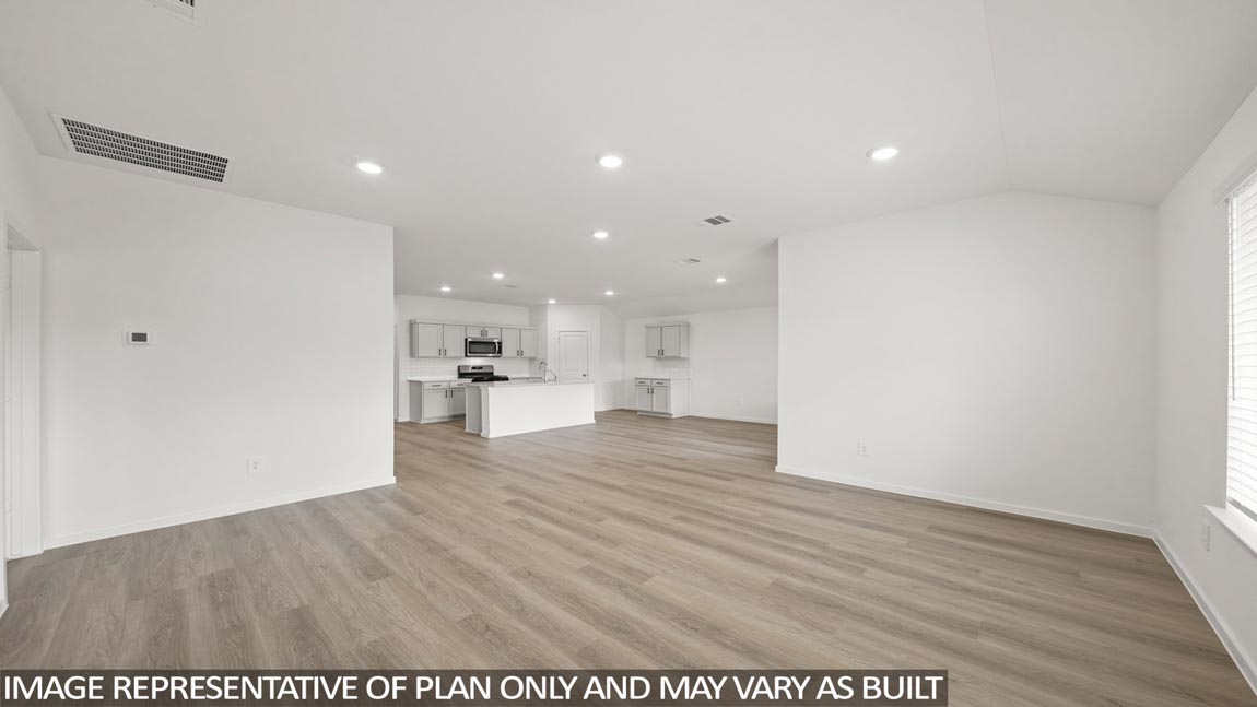 Open concept living, dining, and kitchen area