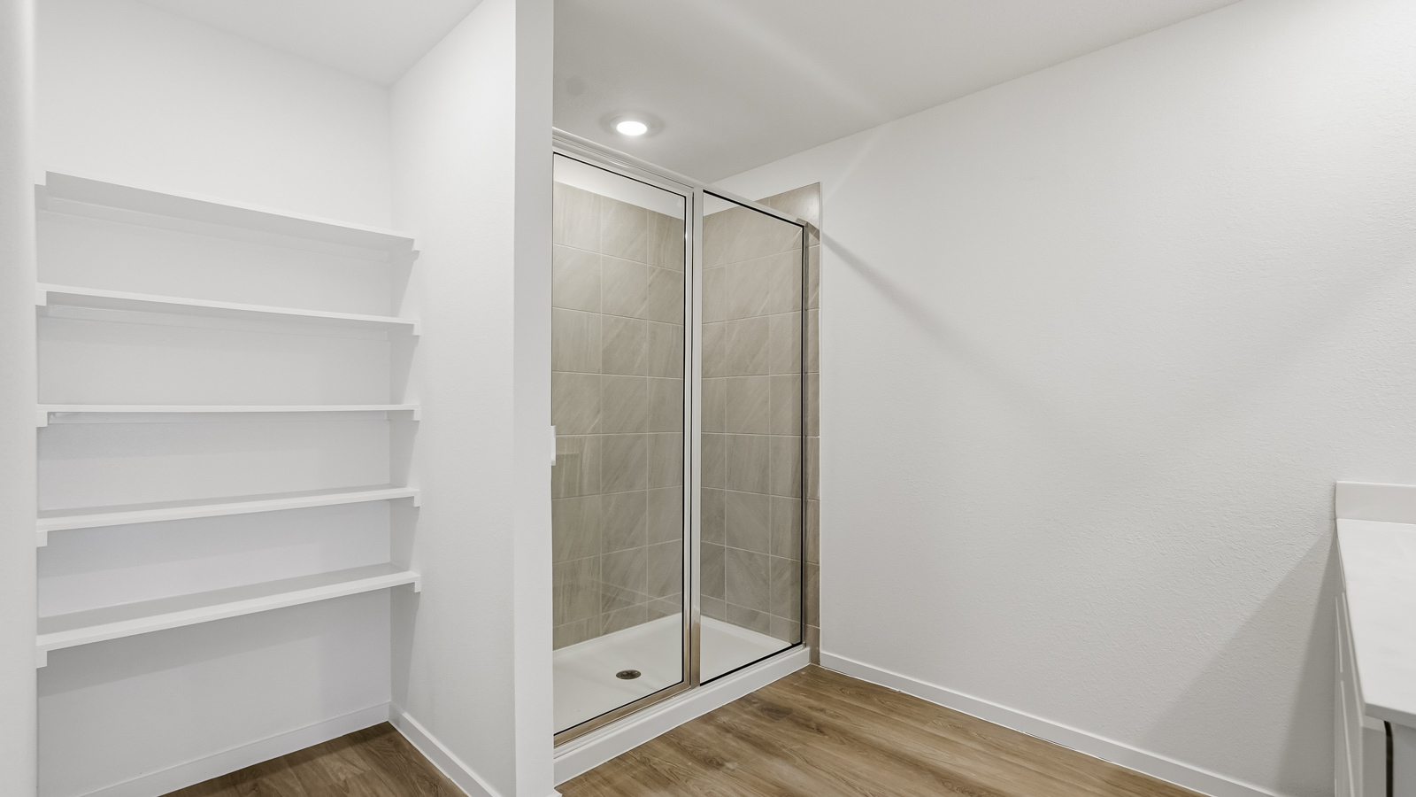 primary bathroom with storage and linen nook