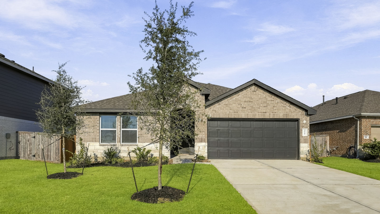 one story home with 2 car garage