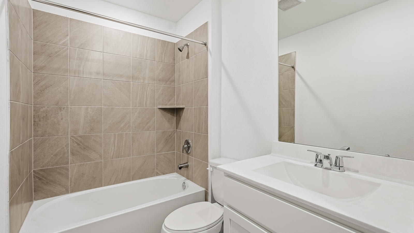secondary bathroom with tub/shower combo