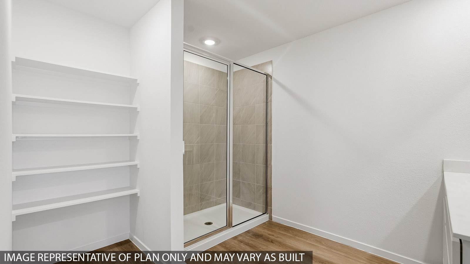bathroom with standing shower and linen nook