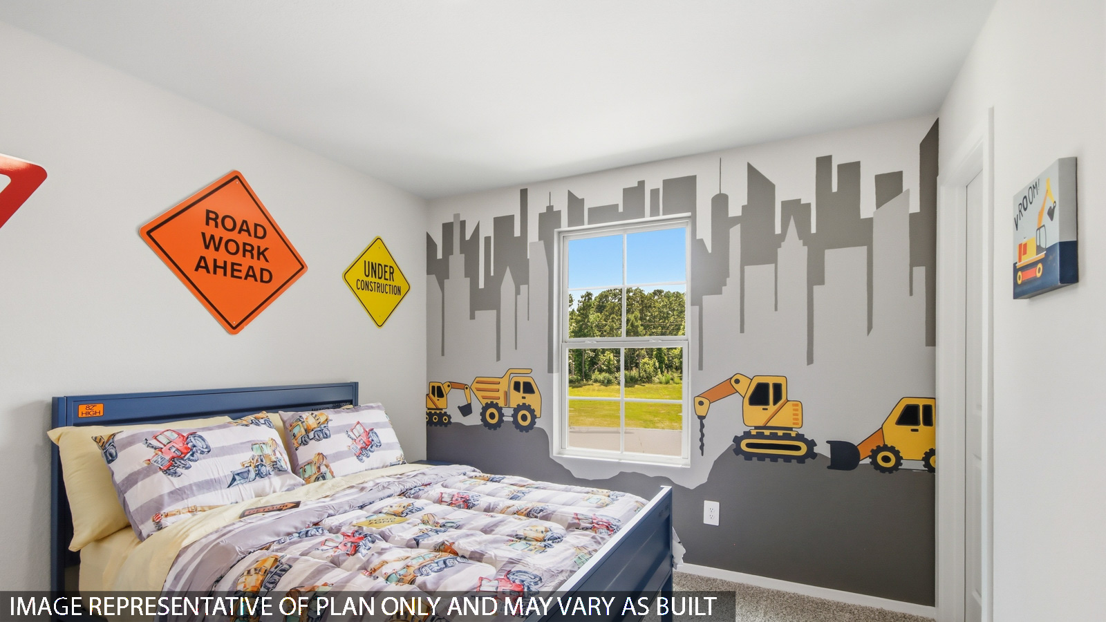 Secondary bedroom with carpet flooring