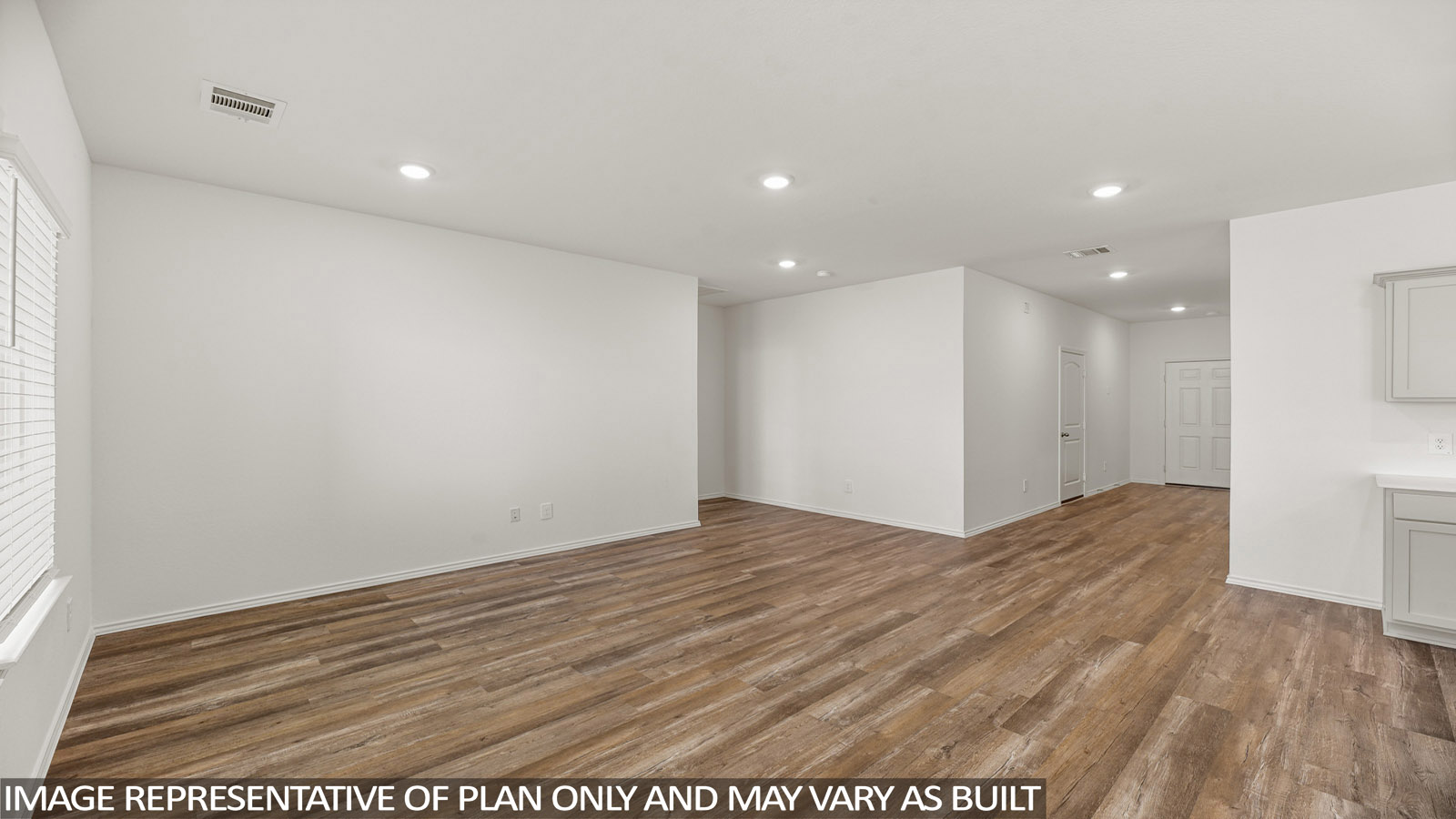 Open concept living, dining, and kitchen area