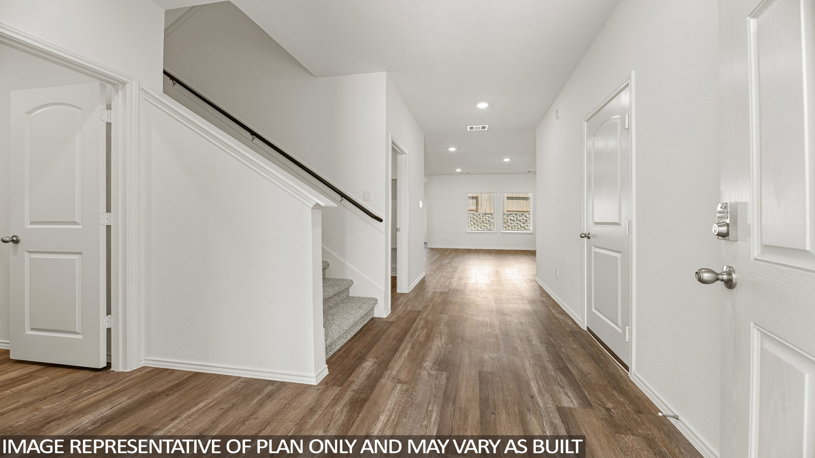 Entry hallway with vinyl flooring