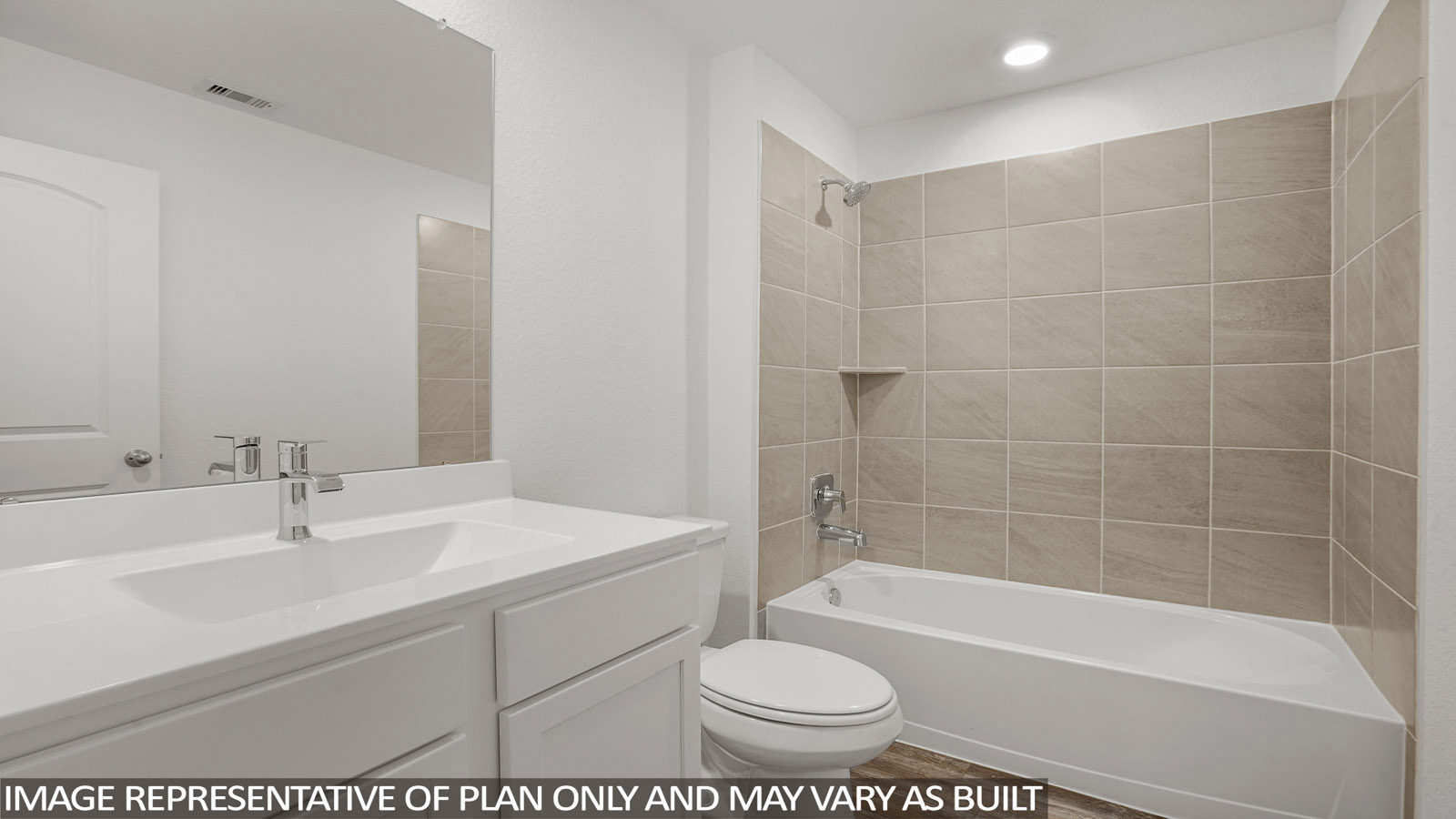 Secondary bathroom with a tile tub/shower combo.