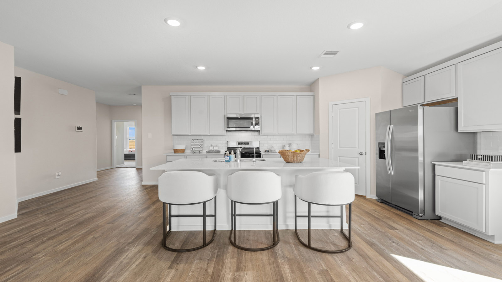 Open concept living, dining, and kitchen area