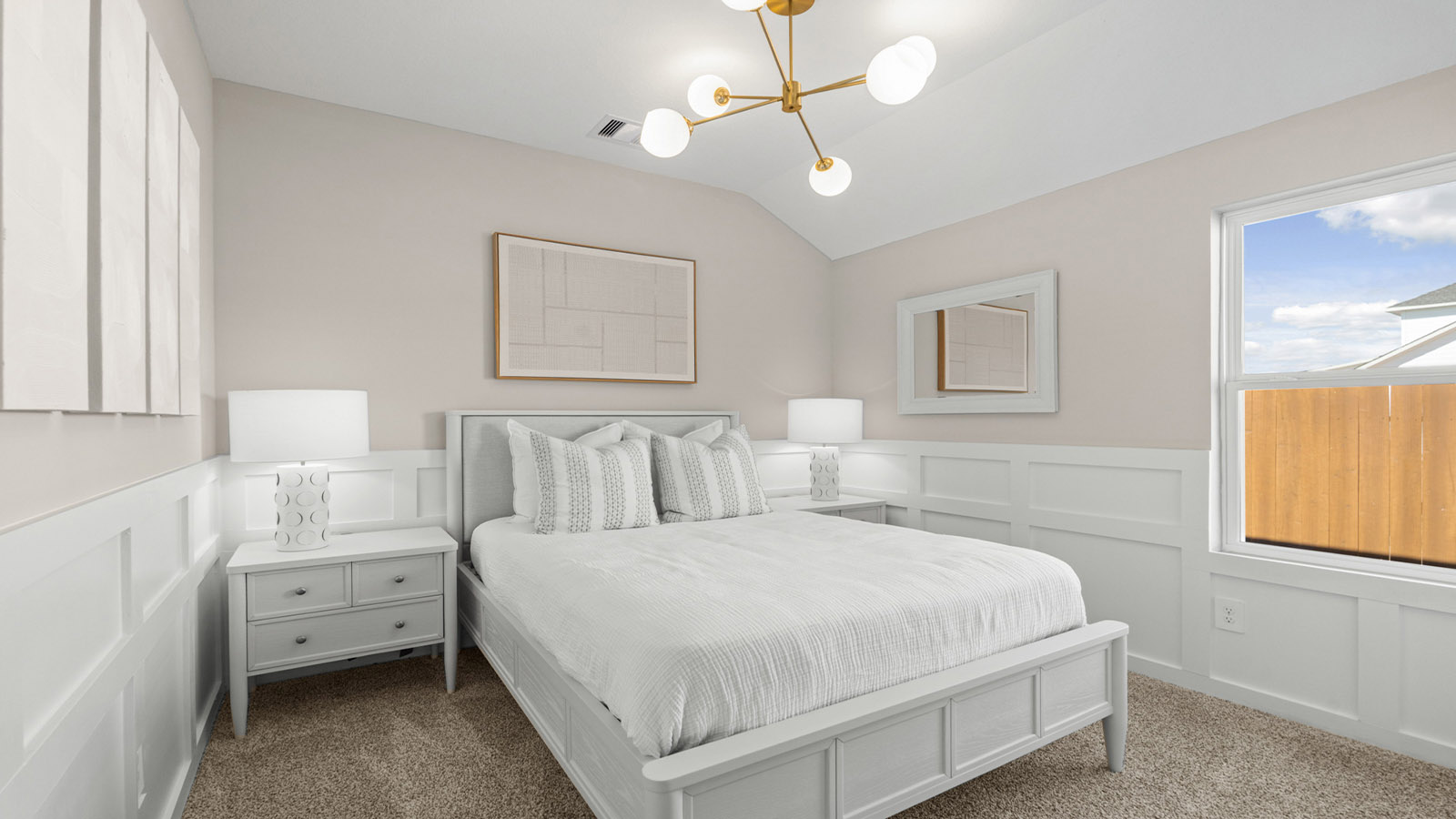 Secondary bedroom with carpet flooring