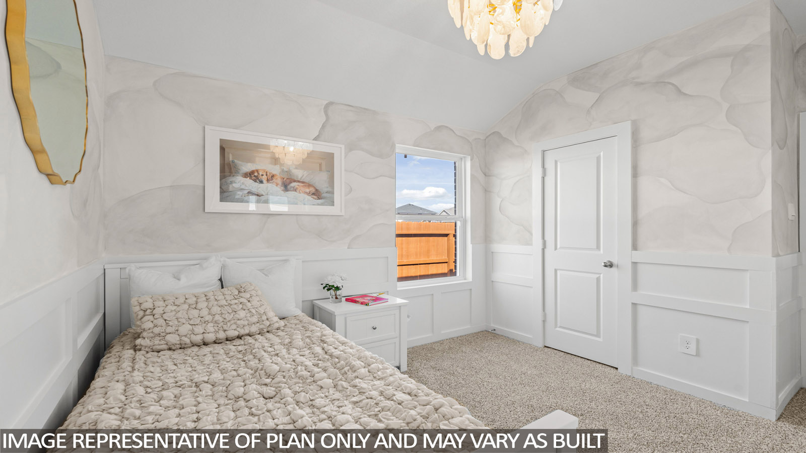 Secondary bedroom with carpet flooring