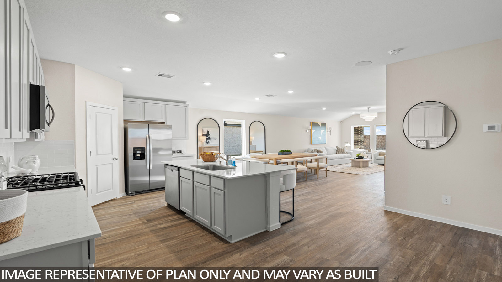 Open concept living, dining, and kitchen area