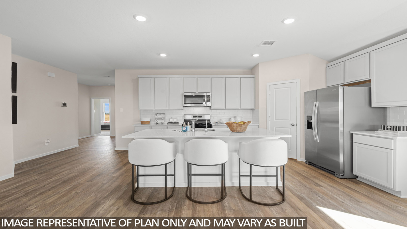 Open concept living, dining, and kitchen area