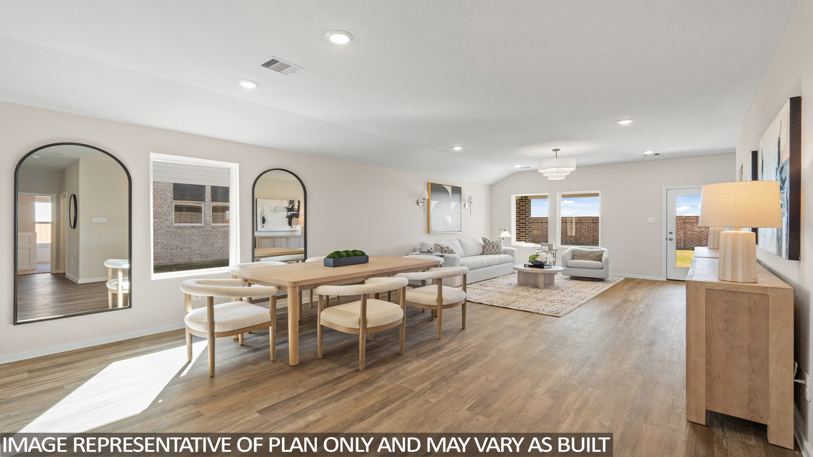 Open concept living, dining, and kitchen area