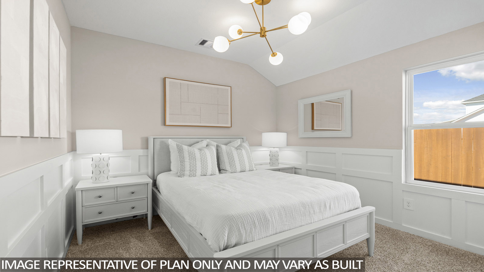 Secondary bedroom with carpet flooring