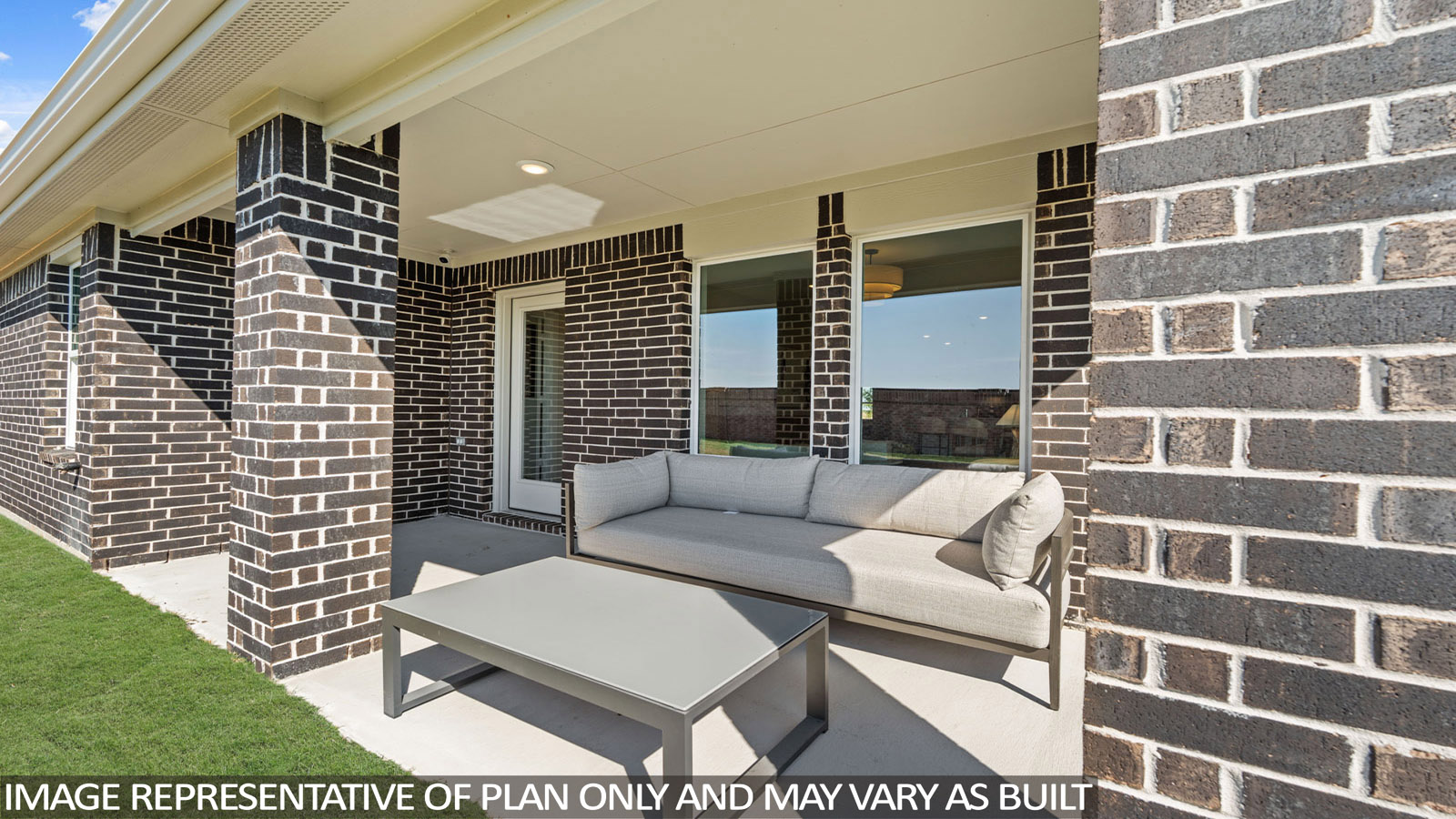 covered patio with overhead lighting