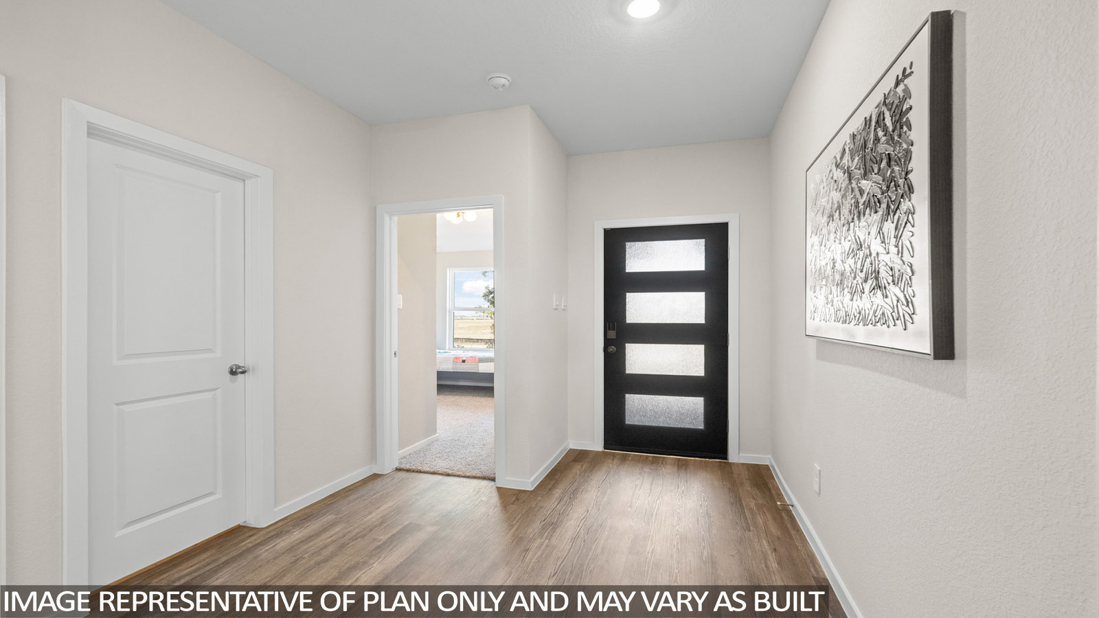 Entry hallway with vinyl flooring