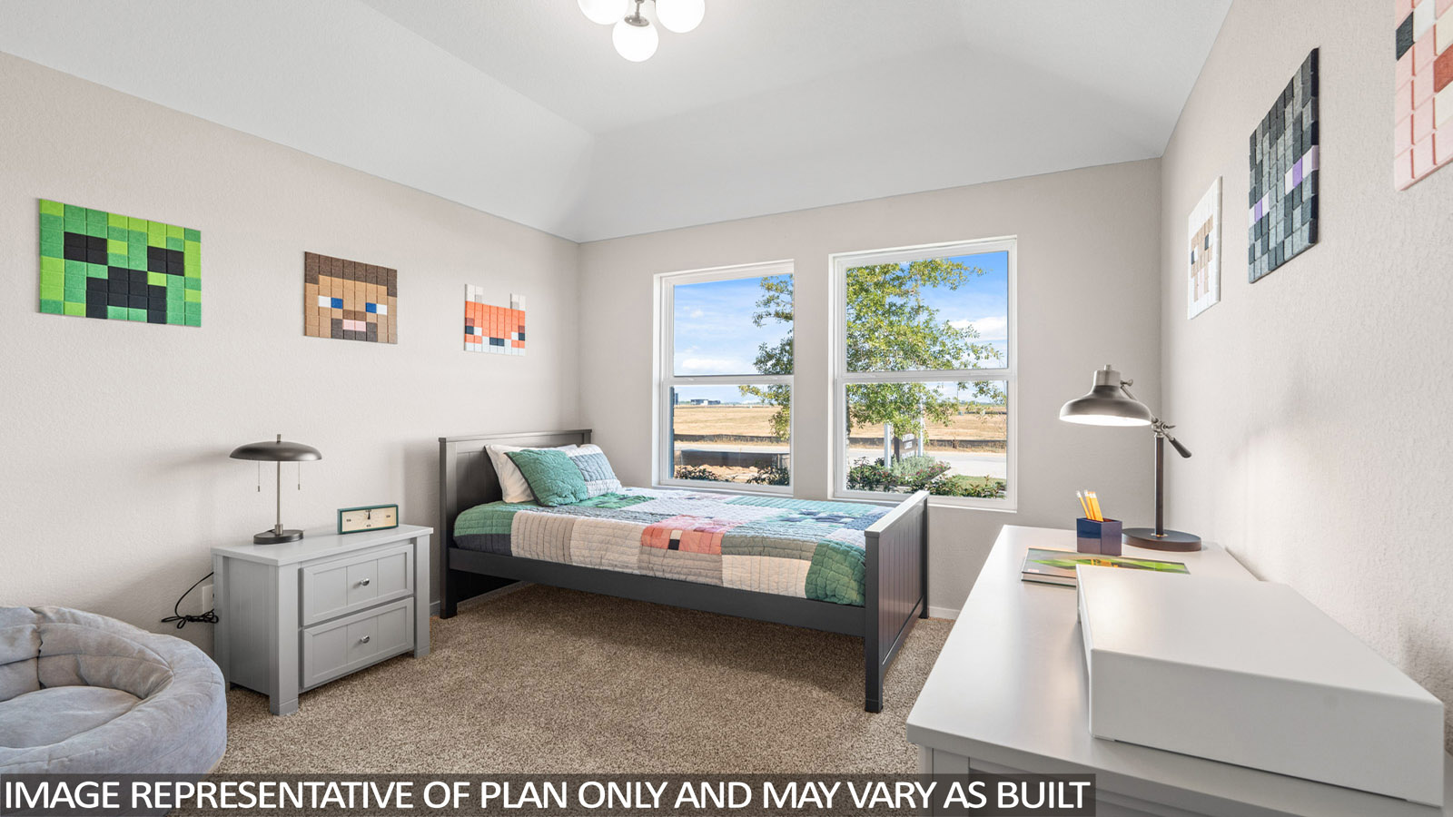 Secondary bedroom with carpet flooring