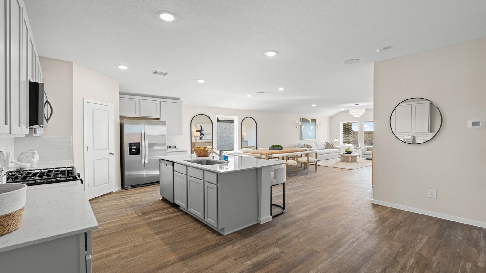 Open concept living, dining, and kitchen area