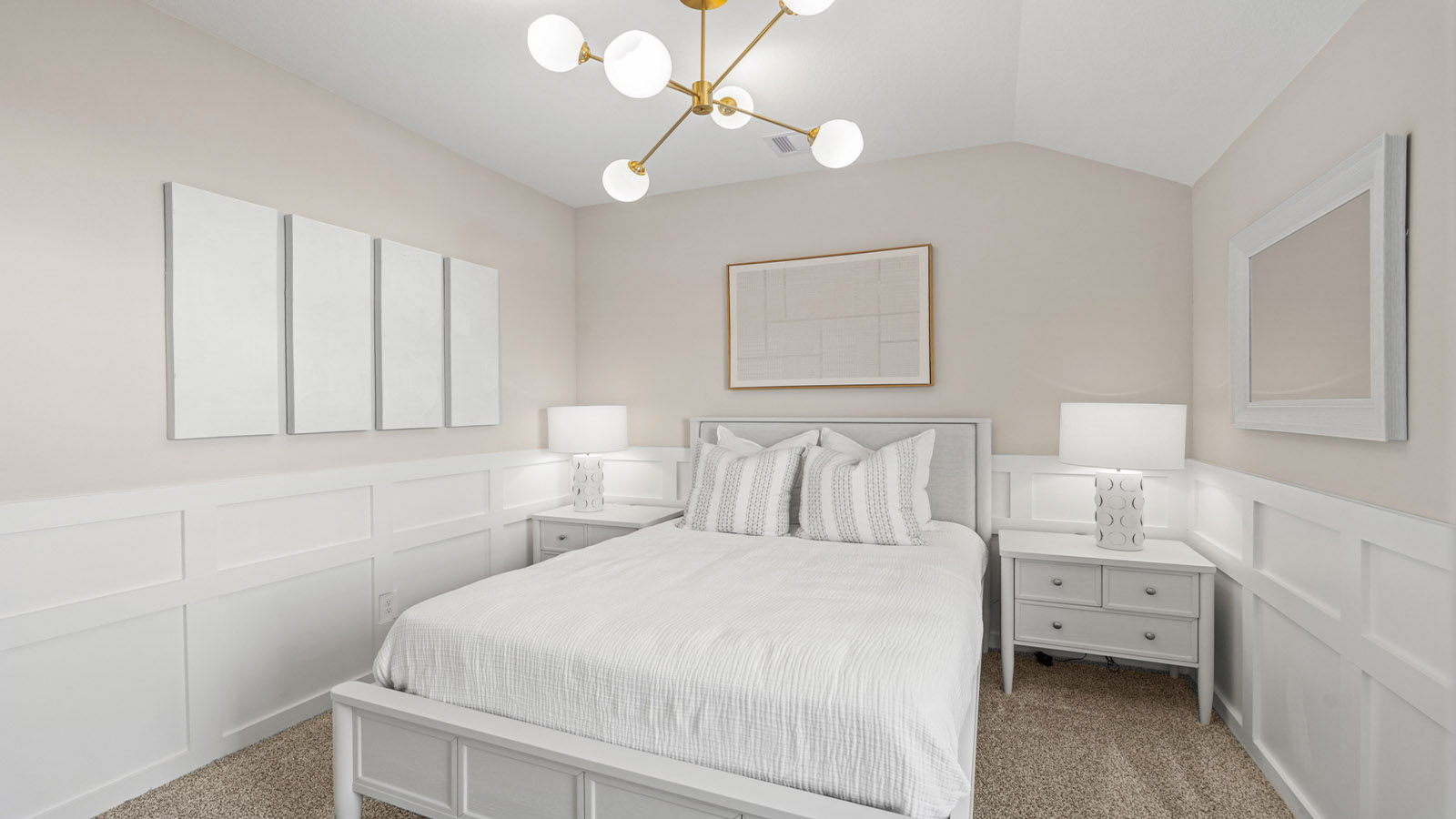 Secondary bedroom with carpet flooring