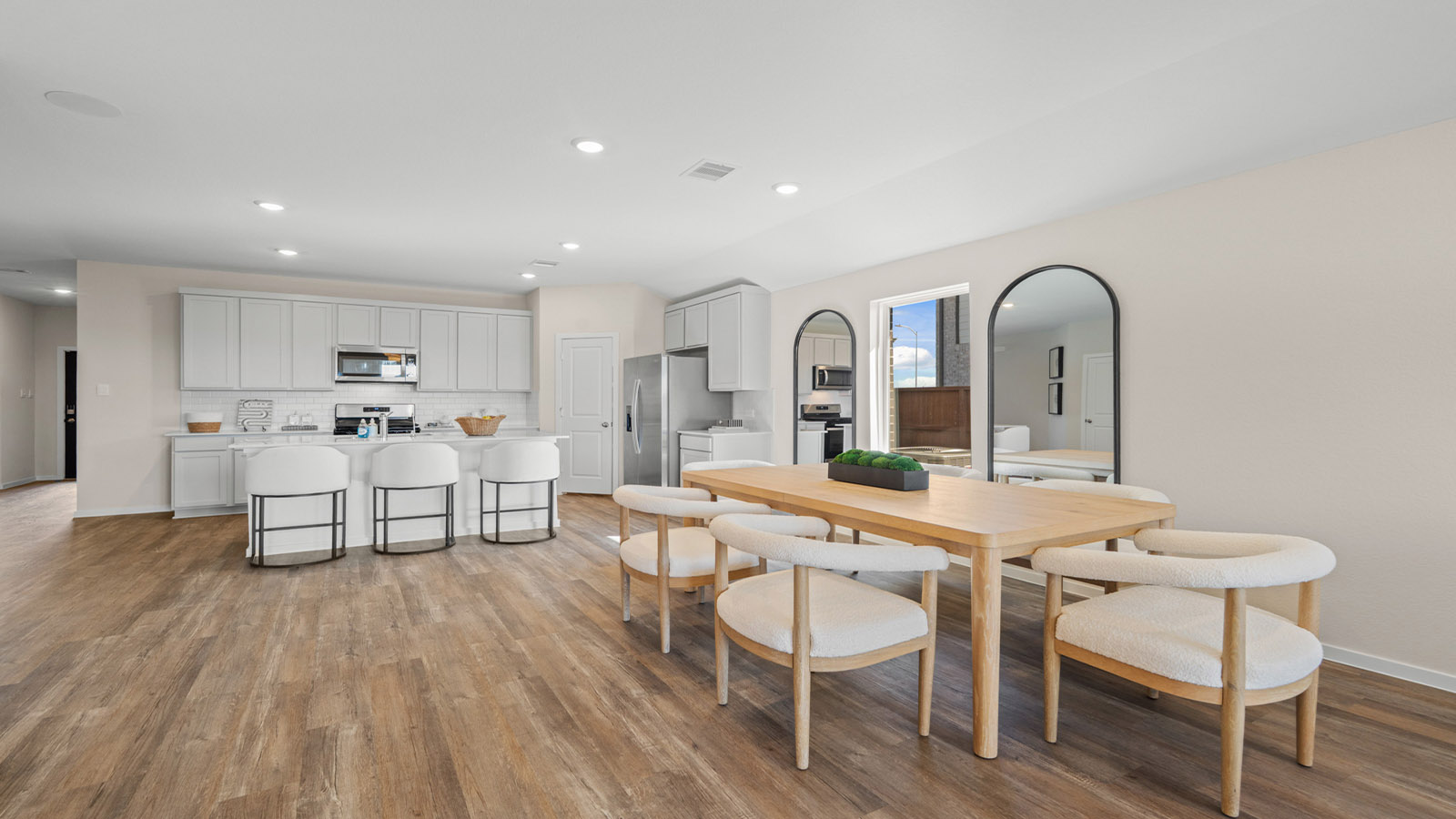 Open concept living, dining, and kitchen area