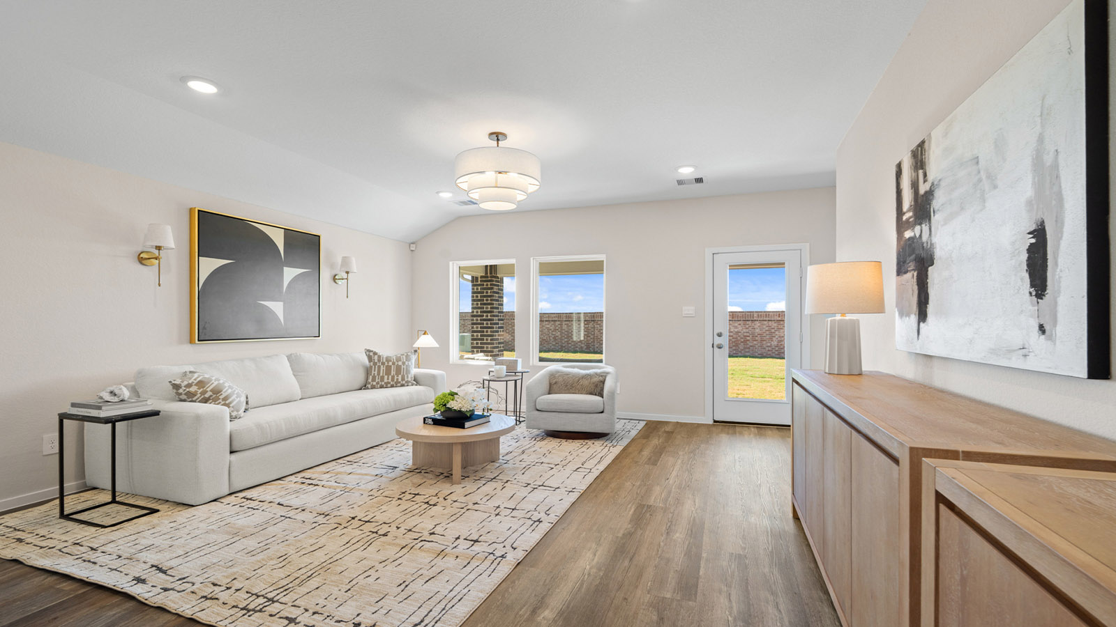 Open concept living, dining, and kitchen area