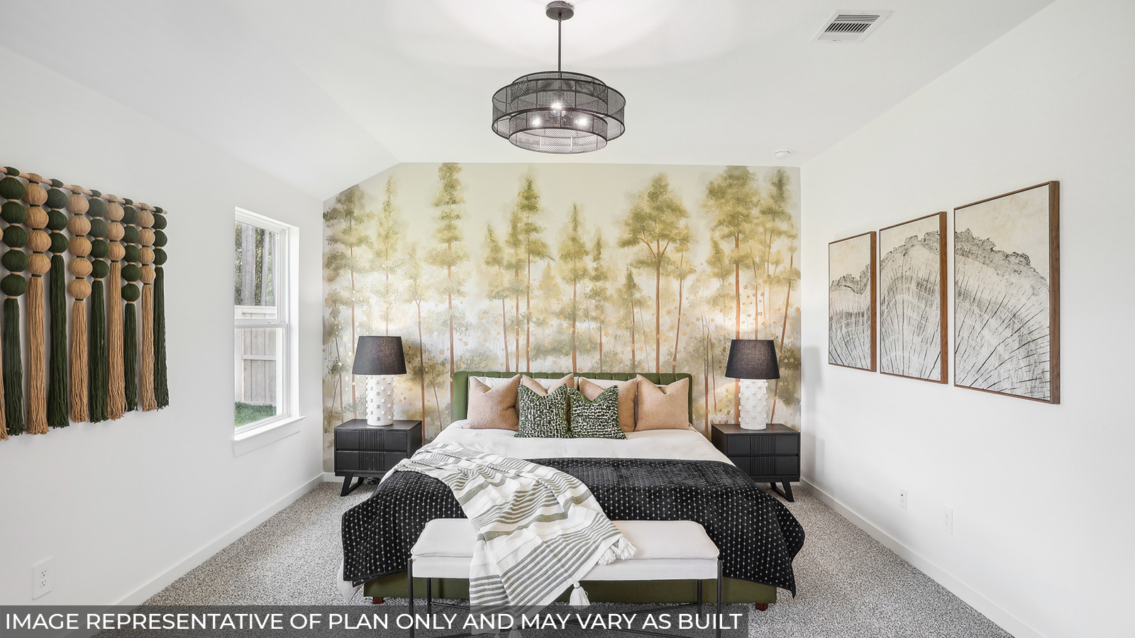 Staged primary bedroom with carpet flooring and a bright window.