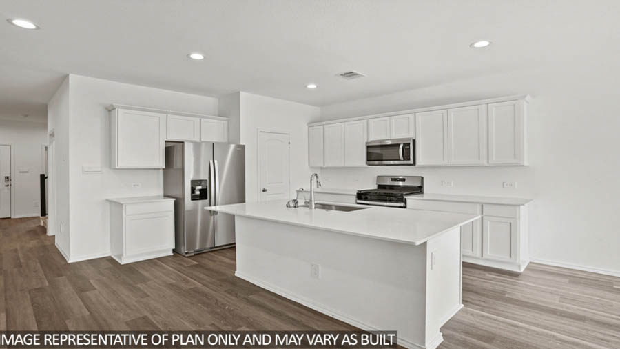 Open concept living, dining, and kitchen area