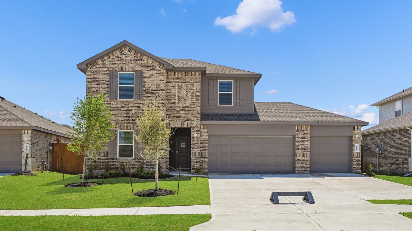 Two story home with three car garage