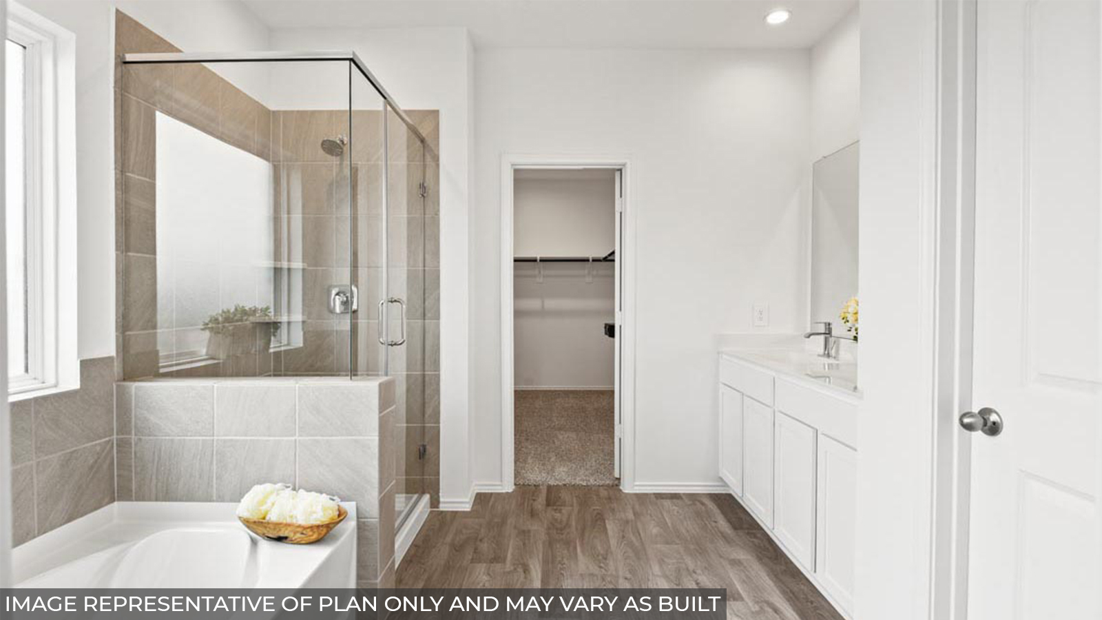 Primary bathroom with tub and shower